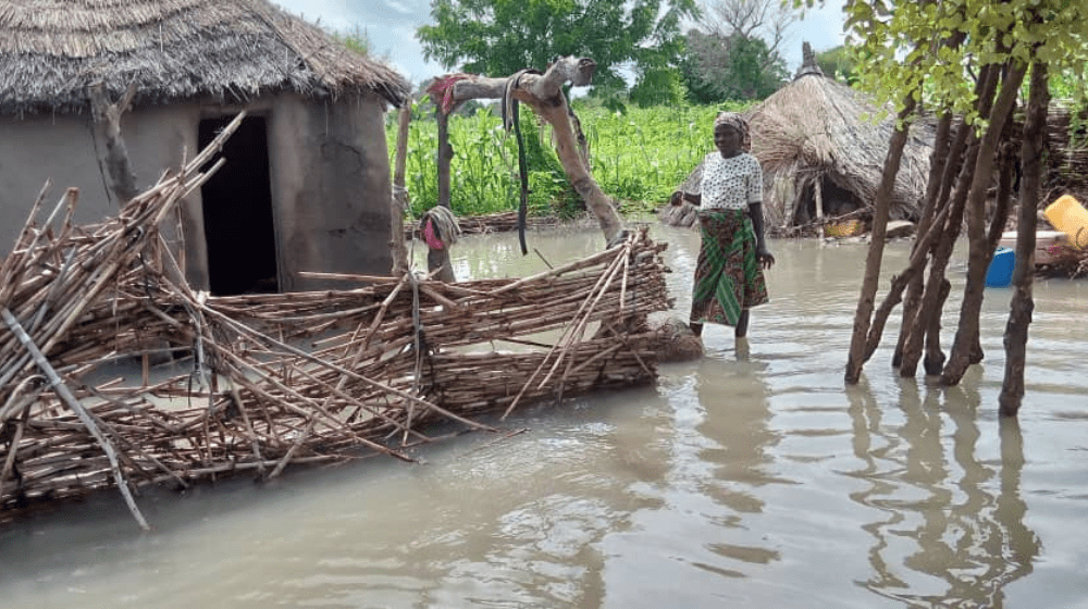 A pregnant woman is stranded by her house amid recent flooding in Cameroon’s Far North region. Credit: UNFPA Cameroon / Samuel Sawalda