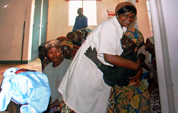 A woman hugs a health worker after her successful fistula repair surgery. ©UNFPA Cameroon